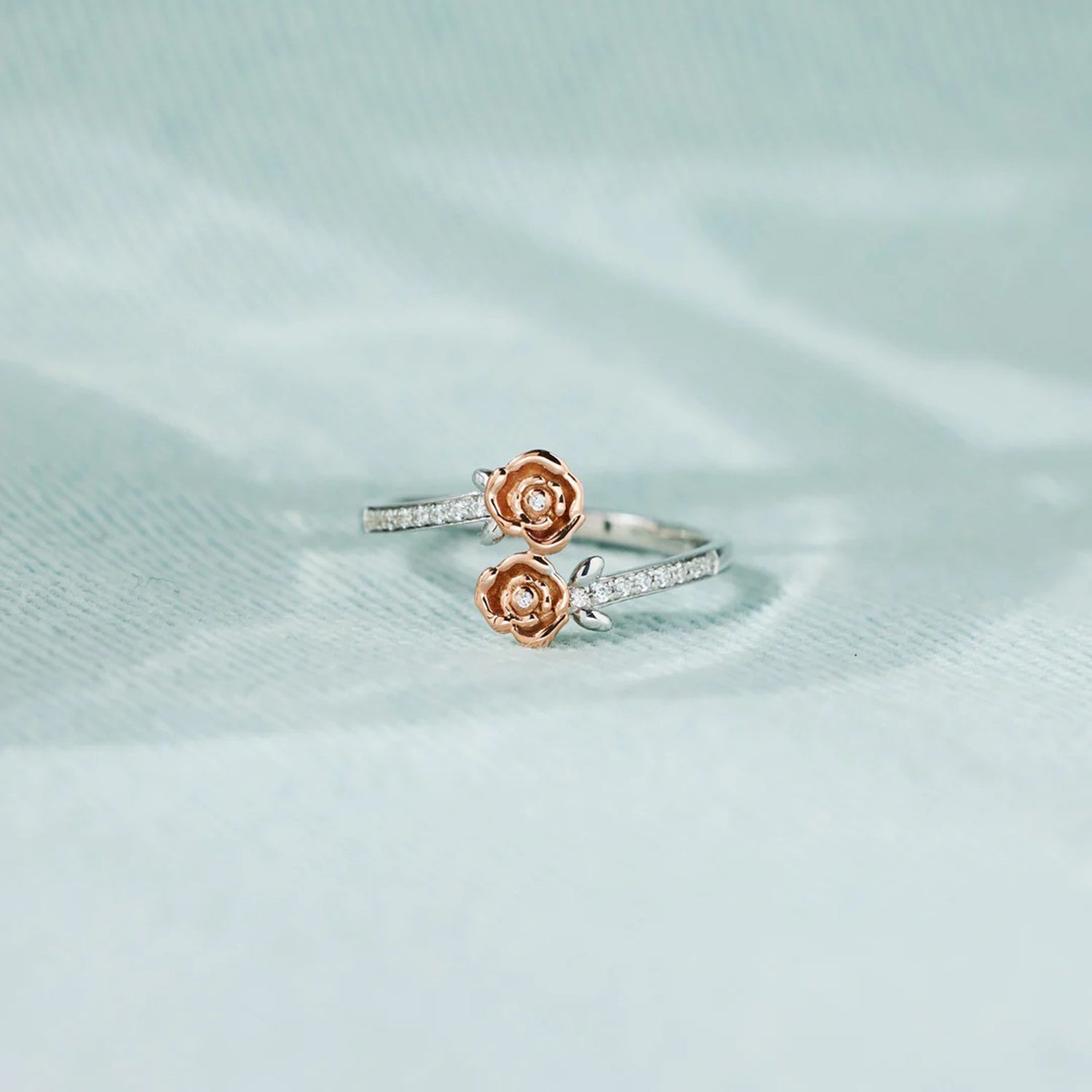 rose-shape-inlaid-zircon-bypass-ring